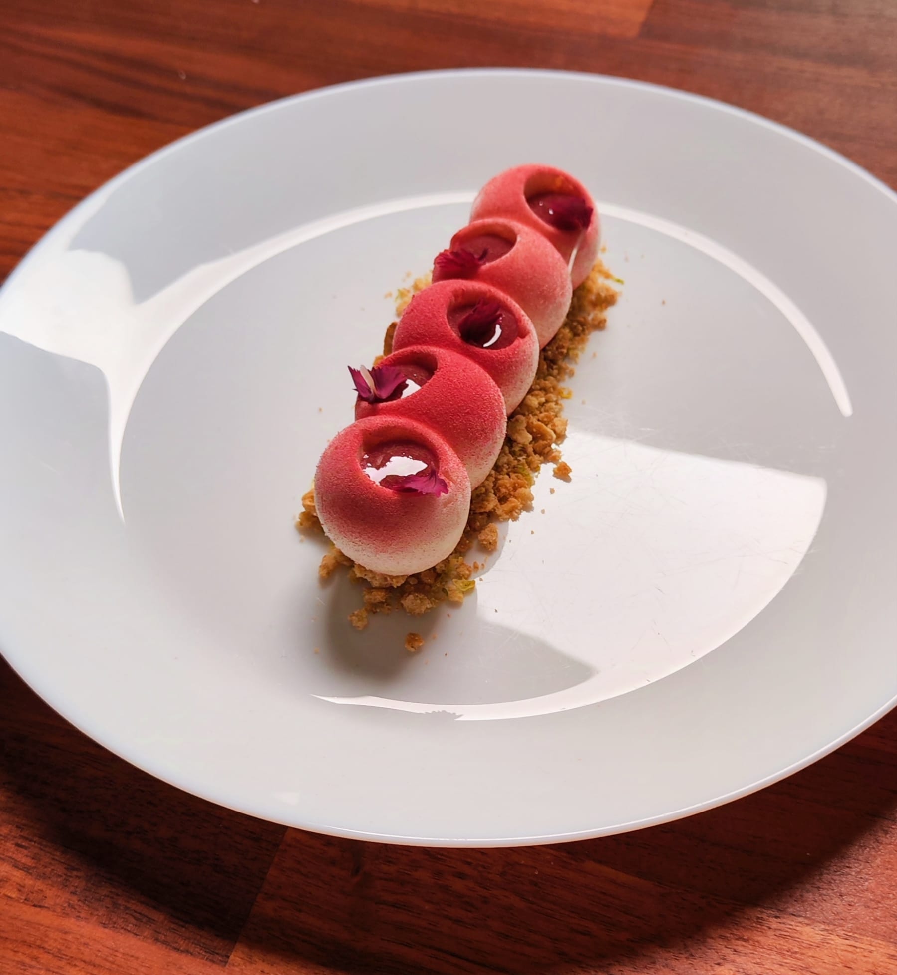 Raspberry dessert domes and crumble
