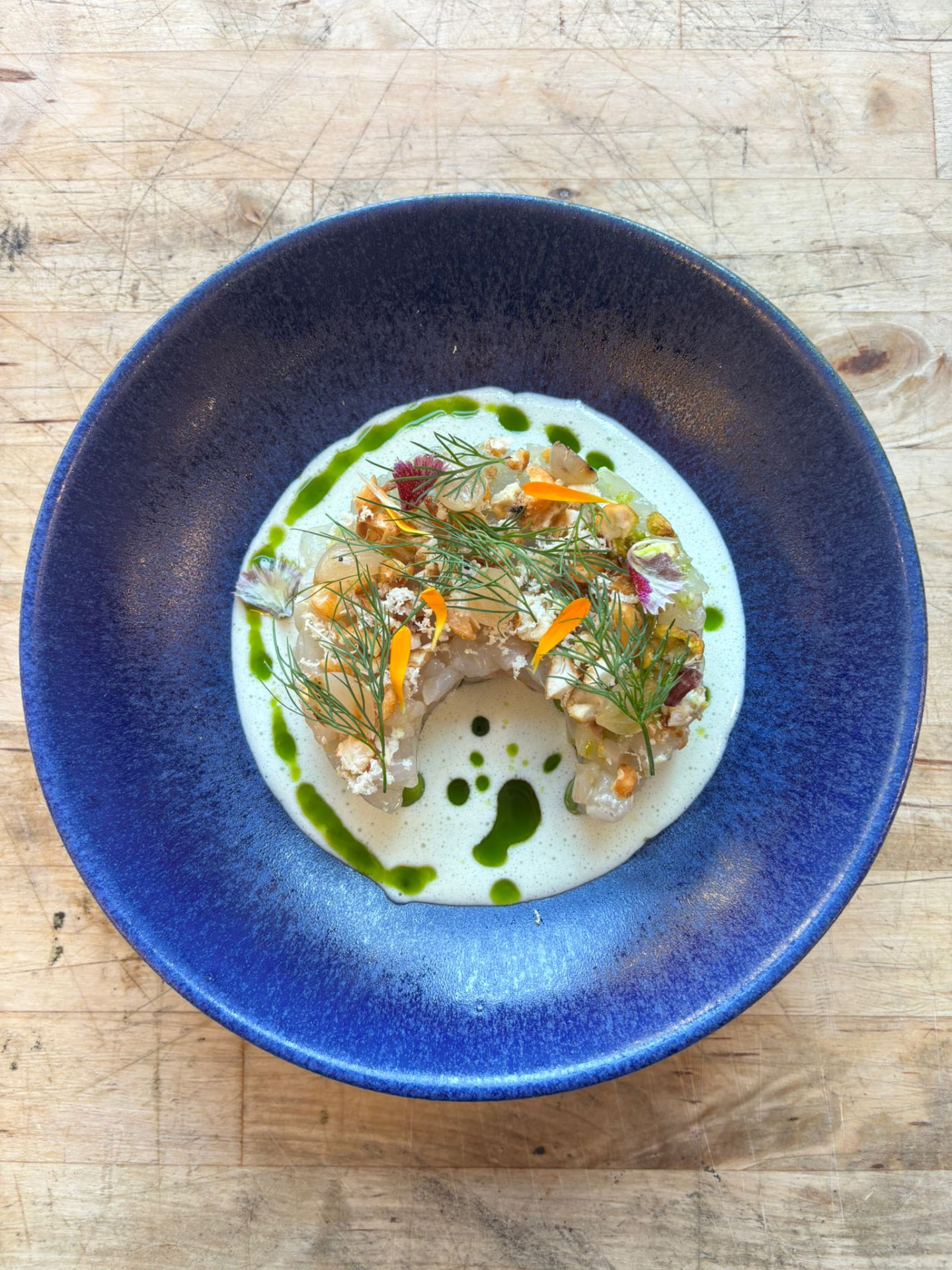Crudo with dill, hazelnut and citrus foam